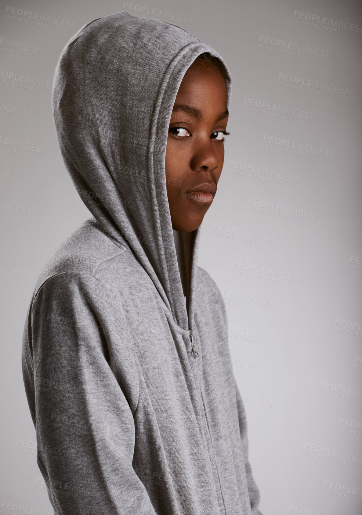 Buy stock photo Hoodie, fashion and portrait of teenager in studio with serious kid in stylish streetwear on grey background. African, child and cool boy with casual style, clothes and comfortable outfit in mockup