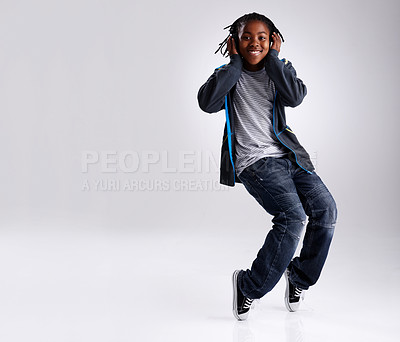 Buy stock photo A young boy hip-hop dancing in the studio