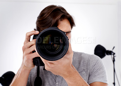 Buy stock photo Portrait, closeup and male photographer with camera lens for studio, casting pictures and photoshoot in USA. Professional videographer, man and DSLR for fashion, digital or macro photography session
