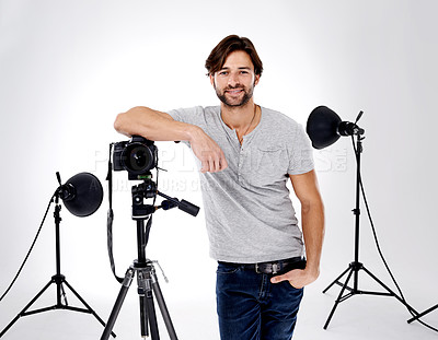 Buy stock photo A professional photographer with his equipment