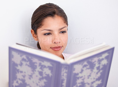 Buy stock photo Woman, relaxing and reading book for learning, knowledge and fantasy novel or literature at home. Female person, fiction and story for education and comfortable, hobby and studying page of journal