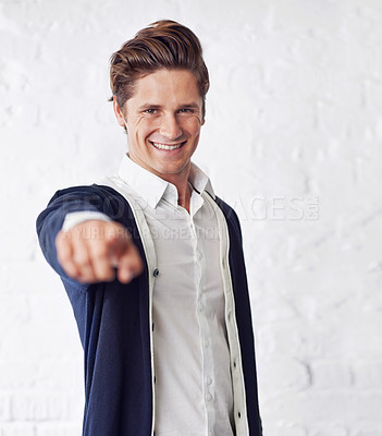 Buy stock photo Portrait, happy and man with hand pointing at you on wall background for attention, offer or invitation. Smile, face and male person with finger gesture for hey, vote or selection, choice or forward
