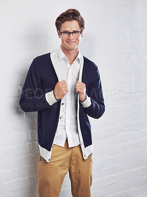 Buy stock photo Glasses, fashion and portrait of man by wall with casual, cool and trendy outfit for confidence. Smile, handsome and young male person with style and spectacles standing by white brick background.