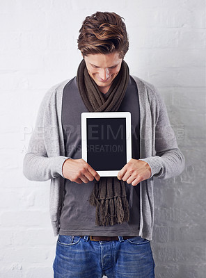 Buy stock photo Man, tablet screen and advertising for social media or marketing on a white studio background. Young male person holding technology display in casual fashion for presentation, app or mockup space