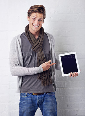 Buy stock photo A handsome young woman showing you the latest digital tablet