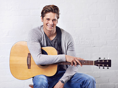 Buy stock photo Man, guitar and musician with portrait for music, acoustic for entertainment and performance on wall background. Busker, artist and musical instrument for art or creativity, track or song with talent