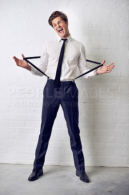 Buy stock photo Man, funny and fashion with crazy, confidence and suit with trendy and stylish clothes. Hipster, male person and wall with event, classic and fancy suspenders with dressing formal and funny joke