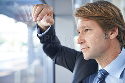 Buy stock photo Shot of a mature businessman in an office building