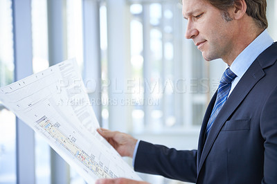 Buy stock photo Engineering blueprint, architecture and man in office with papers for planning, building project and property. Real estate, contractor and person with document, idea or drawing for floor plan