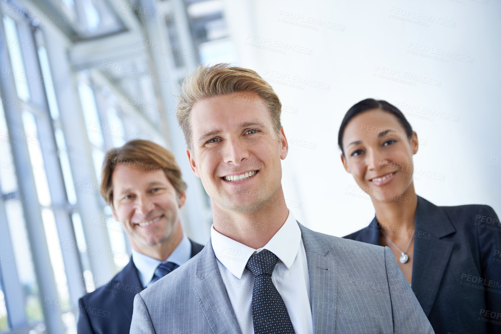 Buy stock photo Collaboration, office and portrait of business people for pride, confidence and teamwork in hallway. Corporate lawyers, professional and happy men and woman for partnership, leadership and about us