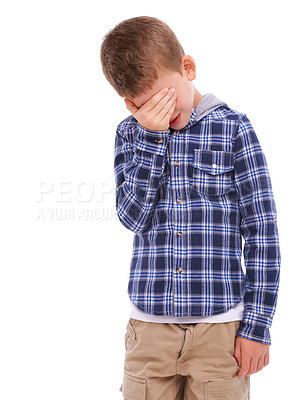 Buy stock photo Sad, angry and child with hand on face for fear isolated on a white background in studio. Mental health, fail and boy kid ashamed about a problem, depression or frustrated on a studio background