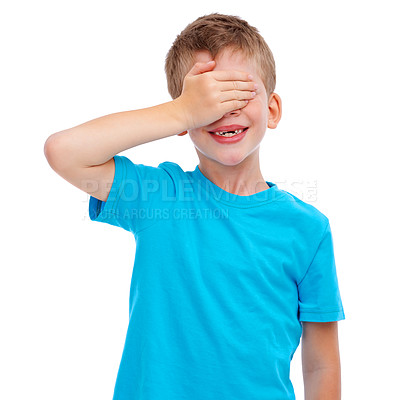 Buy stock photo Children, hide and seek and surprise with a boy in studio isolated on a white background covering his face with his hand. Kids, blind and game with a male child playing on blank advertising space