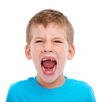 Buy stock photo Boy, studio portrait and screaming with anger on face by white background for mental health, adhd or autism. Child, angry crying and isolated with frustrated emotion and annoyed in childhood