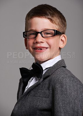 Buy stock photo Studio shot of a cute young boy wearing a retro suit against a grey background