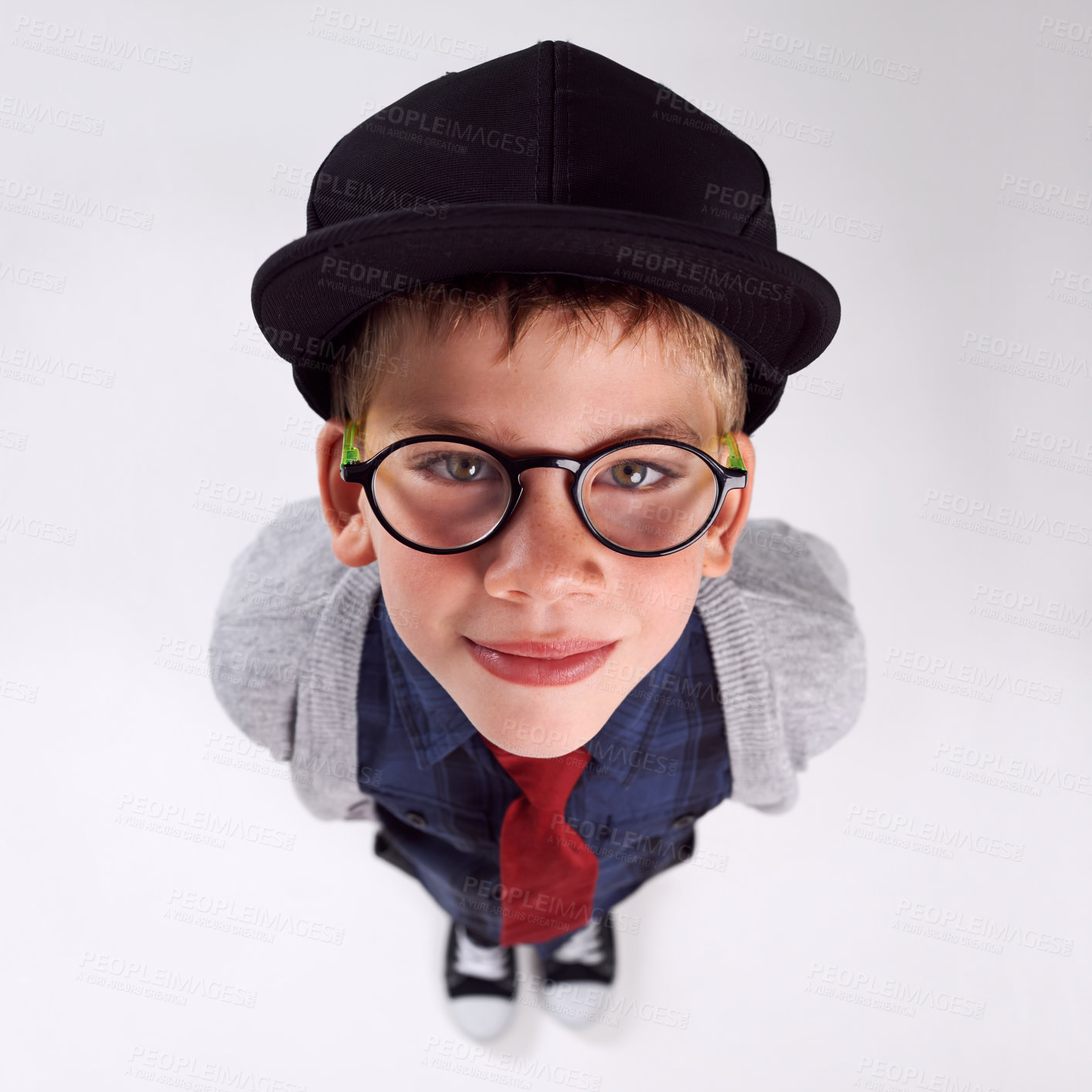 Buy stock photo Glasses, happy and portrait of child in studio for eye care, vision and optical health. Smile, optometry and top view of young boy kid with stylish eyewear or spectacles isolated by gray background.