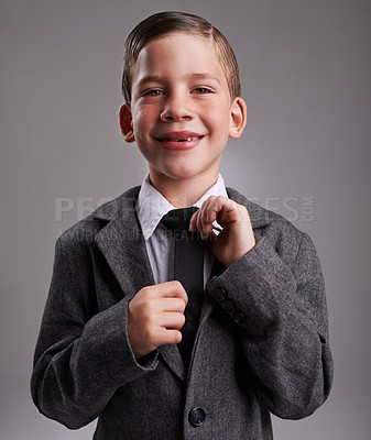 Buy stock photo Studio shot of a cute young boy wearing a retro suit against a grey background