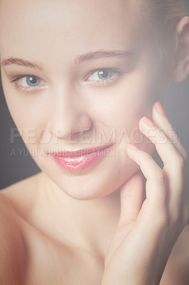 Buy stock photo Skincare, hand and portrait of woman in makeup to glow isolated on a dark studio background. Face, touch and beauty of young model in cosmetics, manicure and spa facial treatment for smooth skin