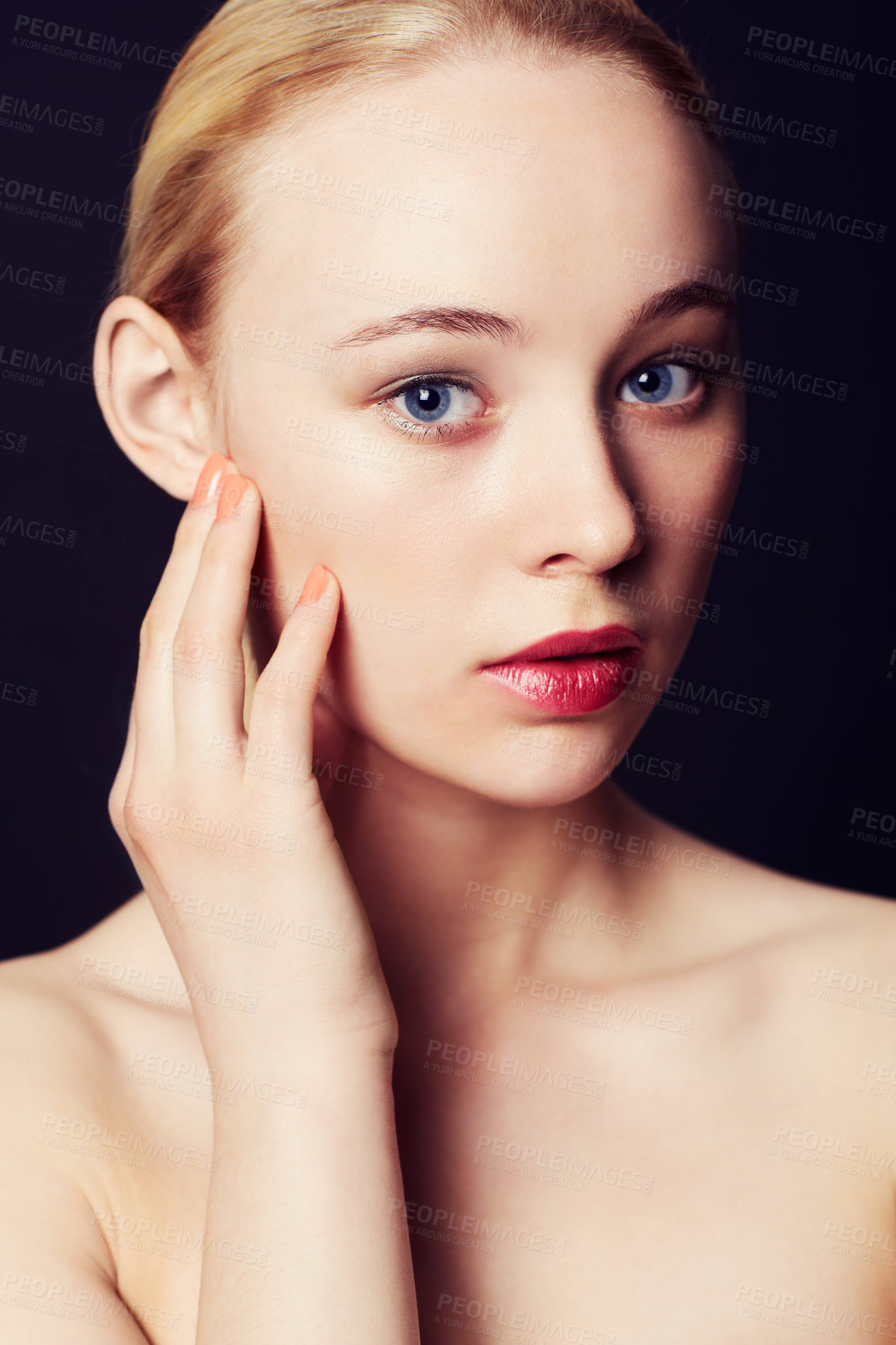 Buy stock photo Beauty portrait of a young blond woman against a black background