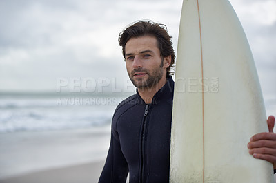 Buy stock photo Man, portrait and surfer on beach for fitness, sport or waves on shore in outdoor exercise. Young male person or athlete with surfboard for surfing challenge or hobby on ocean coast or sea in nature