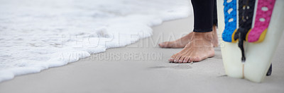 Buy stock photo Feet, shore and surfer on beach for sports, athlete and board for outdoor adventure or ocean waves. Person, legs and closeup of nature for fitness, sea and traveling to water on holiday or vacation