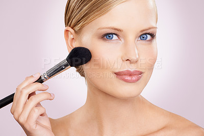 Buy stock photo Cosmetics, brush and portrait of happy woman in studio with confidence, natural makeup or facial glow. Glamour, cosmetics and face of girl on pink background with healthy skin, smile or wellness.