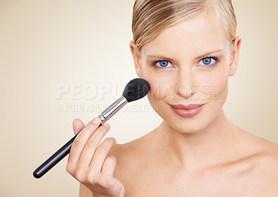 Buy stock photo Cosmetics, brush and mockup portrait of woman in studio with confidence, makeup or facial glow. Glamour, beauty and happy face of girl on beige background space with healthy skin, shine and wellness.