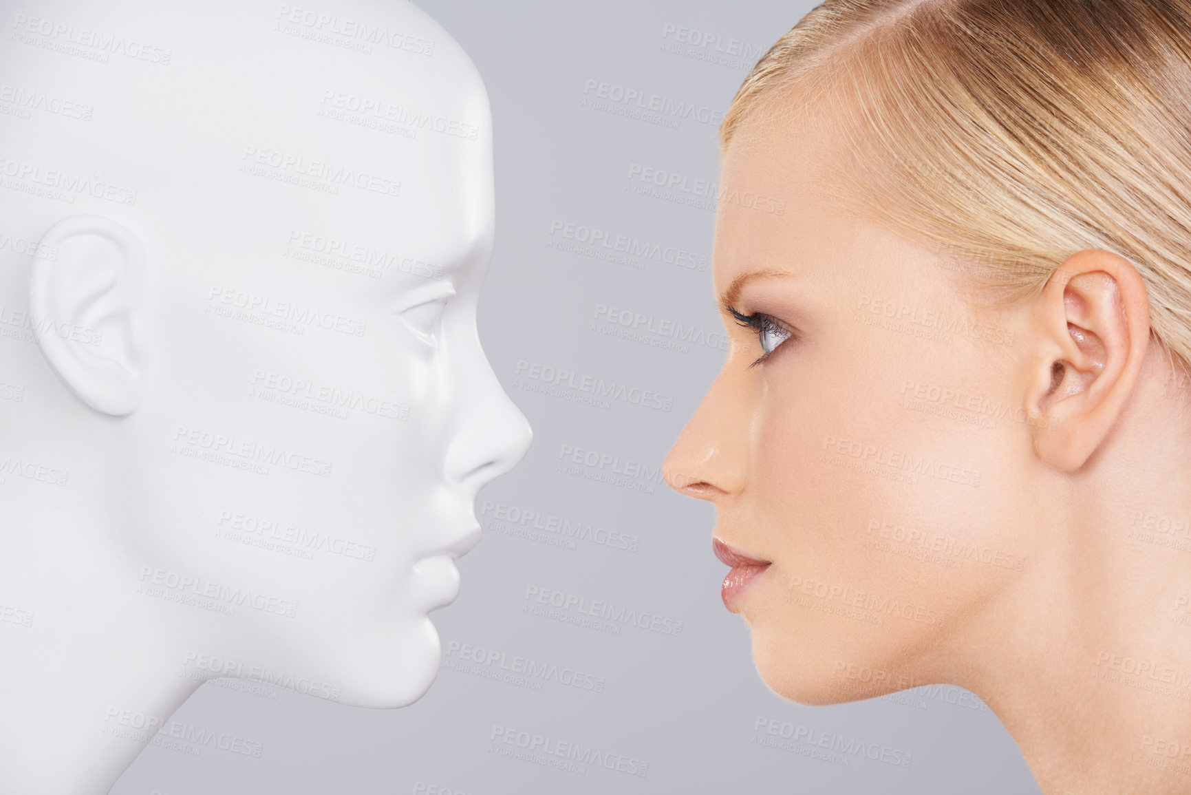 Buy stock photo Close up of a woman looking at a dummy