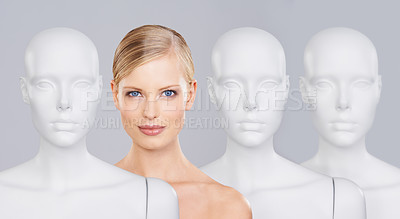 Buy stock photo Woman, mannequins and portrait for identity, skincare and individuality on studio background. Person, beauty and dummy with face for creativity and cosmetics or unique ideas for satisfaction and skin