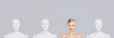 Buy stock photo Woman, face and beauty with mannequin and unique for skincare, wellness and portrait on white background. Banner, natural cosmetics and dermatology with individuality, robot or dummy in studio