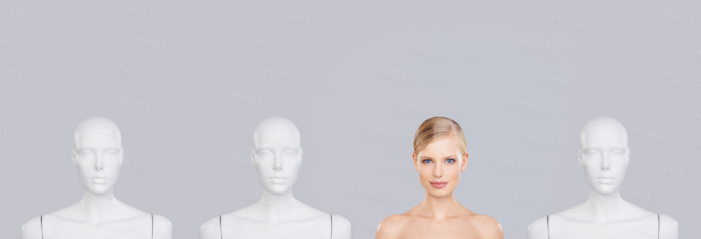 Buy stock photo Woman, face and beauty with mannequin and unique for skincare, wellness and portrait on white background. Banner, natural cosmetics and dermatology with individuality, robot or dummy in studio
