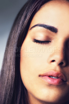 Buy stock photo Face, natural beauty and woman with eyes closed, calm for cosmetics and dermatology on grey background. Clean skin facial and wellness, young Brazilian model with skincare and antiaging in studio