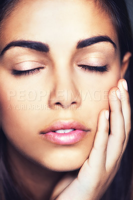 Buy stock photo Face, touch and skincare of woman with eyes closed, beauty and glow in spa facial treatment. Hand, natural and serious young model in cosmetics for aesthetic, dermatology and smooth skin for wellness