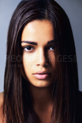 Buy stock photo Shot of a beautiful young woman in the studio