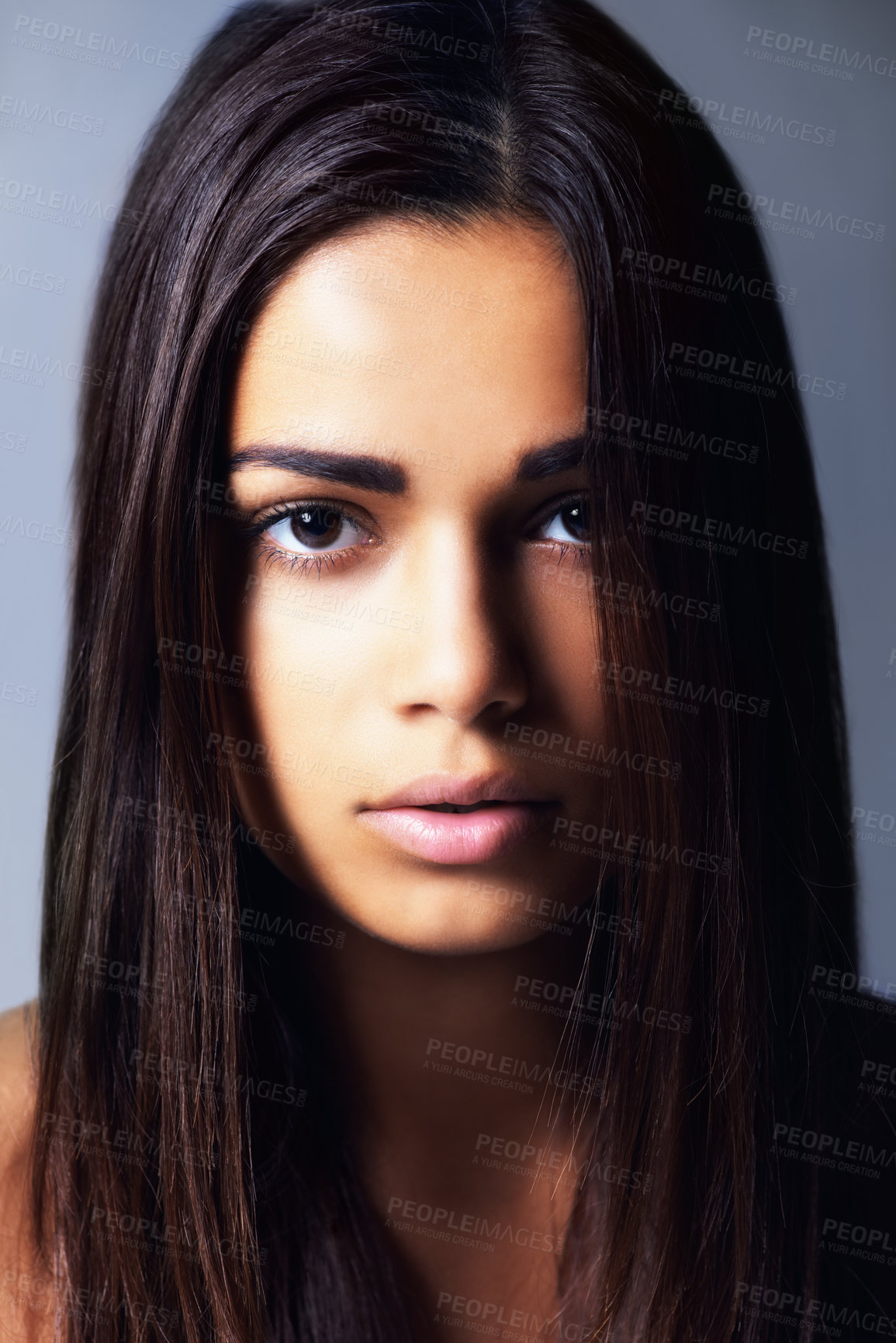 Buy stock photo Shot of a beautiful young woman in the studio