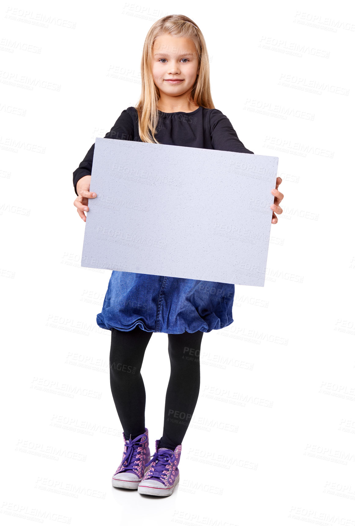 Buy stock photo Studio shot of a young girl holding up a blank sign for copyspace