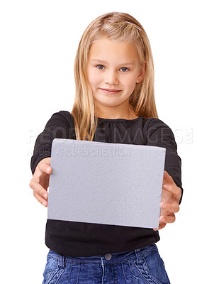 Buy stock photo Poster, presentation and smile with portrait of child in studio for announcement, advertising and idea. Promotion, opinion and review with girl and sign on white background for vote, space and mockup