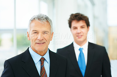 Buy stock photo Mature, businessman and professional portrait in company with boss of team in London. Happy, manager and man in lobby with leadership, pride and confidence in business with person on staff in office