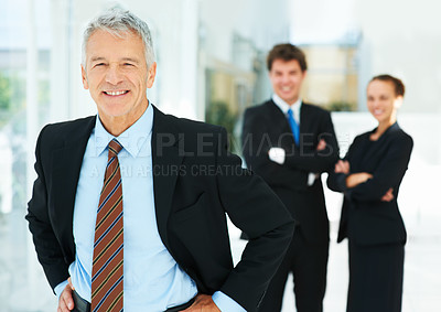 Buy stock photo Business man, CEO and smile in portrait, leadership for team at consulting agency with confidence and pride. Management, senior executive in workplace and consultant at company for corporate career