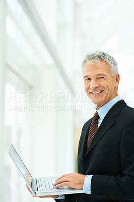 Buy stock photo Executive, smile and laptop for working with technology in office with authority for budgets. Man, happiness and professional with suit as employee or worker in corporate company for business 