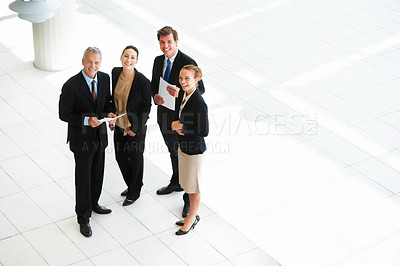Buy stock photo Top view, portrait and business people in a lobby, teamwork and smile with mockup space and cooperation. Group, manager or employees with collaboration or partnership with ideas, professional or plan