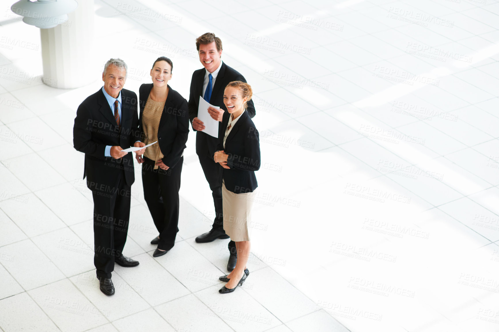Buy stock photo Top view, portrait and business people in a lobby, teamwork and smile with mockup space and cooperation. Group, manager or employees with collaboration or partnership with ideas, professional or plan
