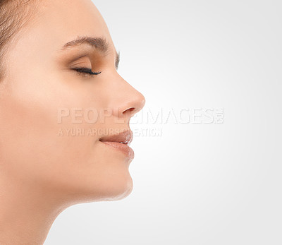 Buy stock photo Beauty, face and girl for self care with makeup for natural look, closeup and wellness for skincare. Woman, dermatology and cosmetics in studio with mockup space, facial and routine for healthy skin