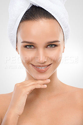 Buy stock photo Woman, skincare and healthy skin in studio portrait, confident and proud of glow on white background. Happy female person, towel and smile for facial treatment, cosmetics and dermatology for grooming