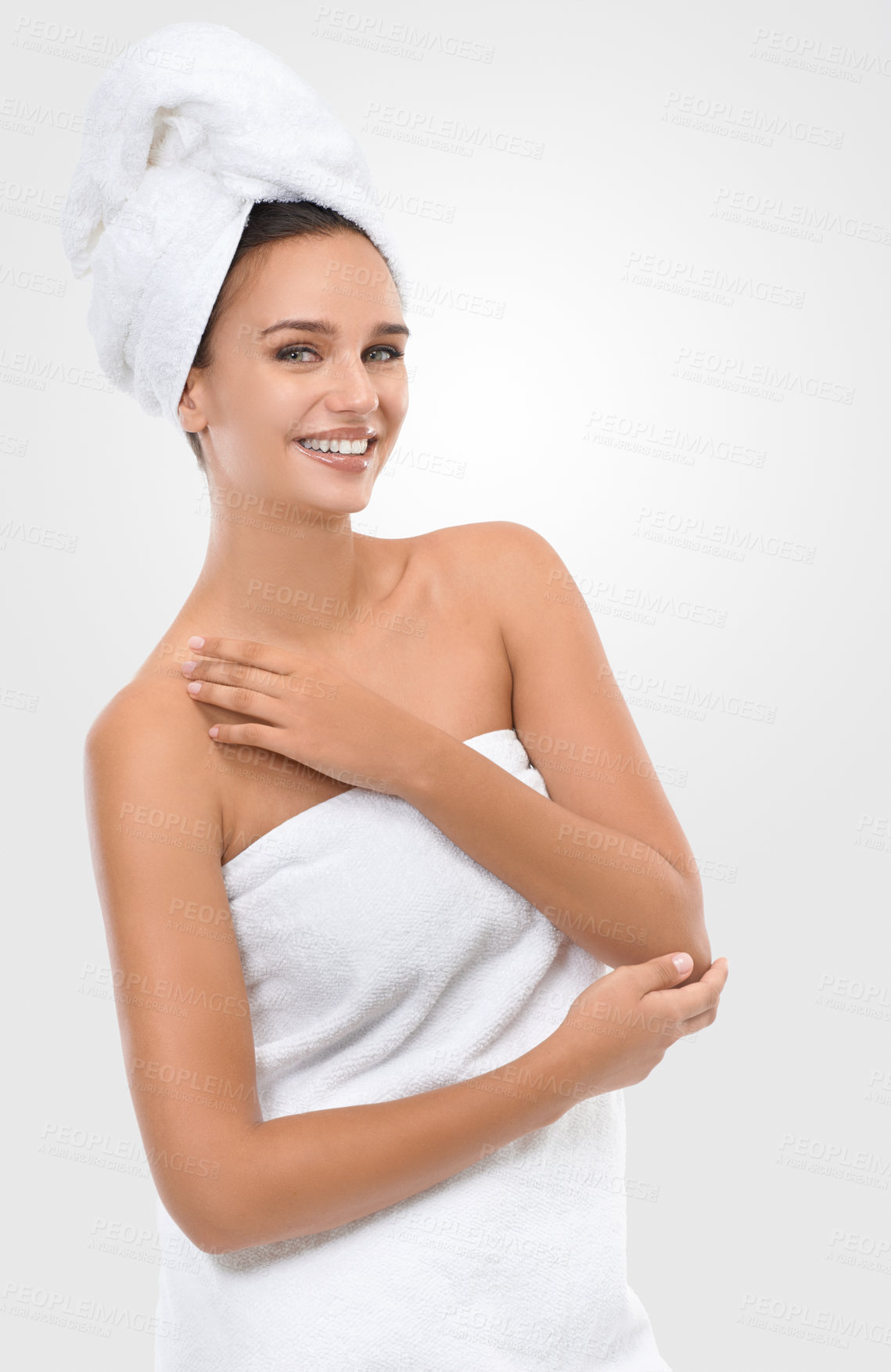 Buy stock photo Woman, skincare and cosmetology in studio portrait, confidence and proud of shine on white background. Happy female person, towel and smile for facial treatment, glow and dermatology for grooming