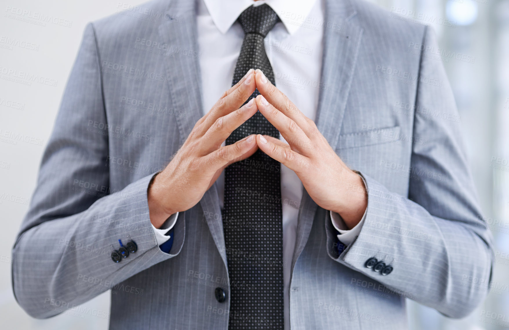 Buy stock photo Hands in front of chest, business and man with confidence, closeup and suspicious in workplace. Person, employee or consultant in suit, gesture or deception with fraud or idea with feedback or review