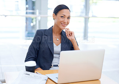 Buy stock photo  A young ethnic businesswoman using her laptop