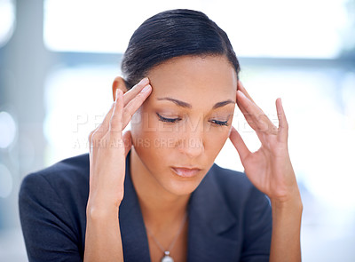 Buy stock photo Frustrated, headache and business woman with stress, anxiety or mental health from pressure at office. Closeup of young female person with migraine or depression in burnout, fatigue or financial debt