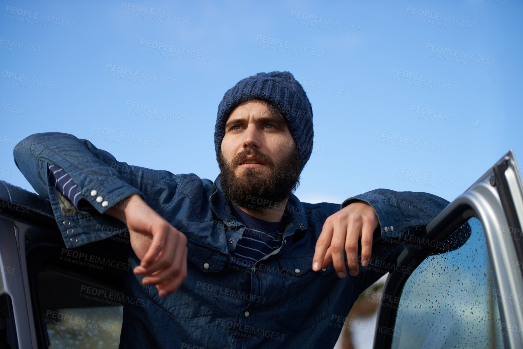 Buy stock photo Man leaning on car door, thinking and confidence with daydreaming and rugged style with vacation. Person, outdoor and guy with transportation and thoughts with wonder and travel with motor vehicle 