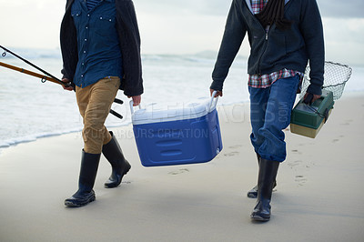 Buy stock photo Fishing, walking and men with cooler on beach together with tackle box, water and holiday. Ocean, fisherman and feet of friends with rods, bait and tools at waves on winter morning vacation at sea.