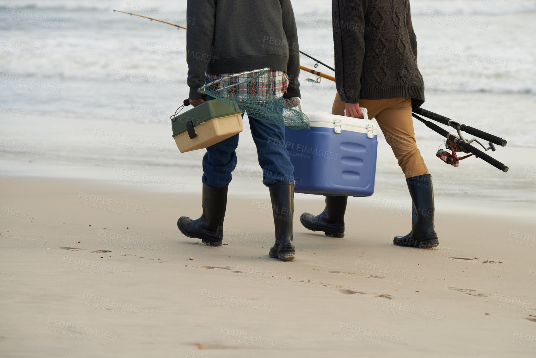 Buy stock photo Walk, fishing and men on beach together with cooler, tackle box and holiday adventure. Ocean, fisherman and friends with rods, bait and tools for hobby at waves on winter morning vacation at sea.